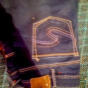 Women’s silver jeans like new